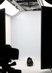 black sport shoe in 360 photography studio